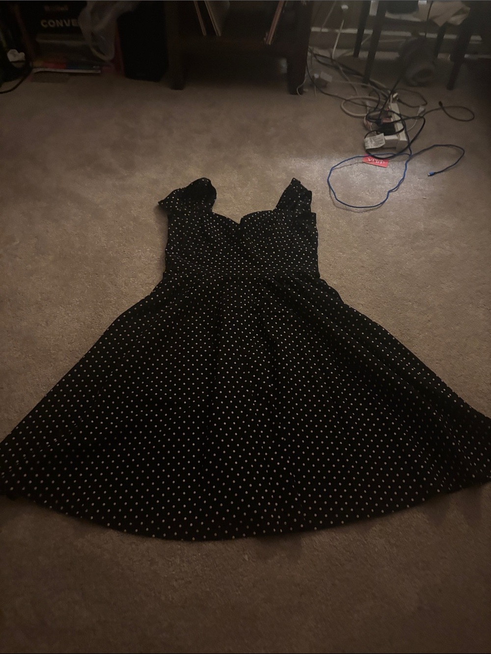 Black dress with white polka dots